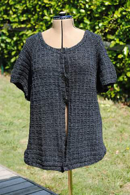 La cape boutonnée