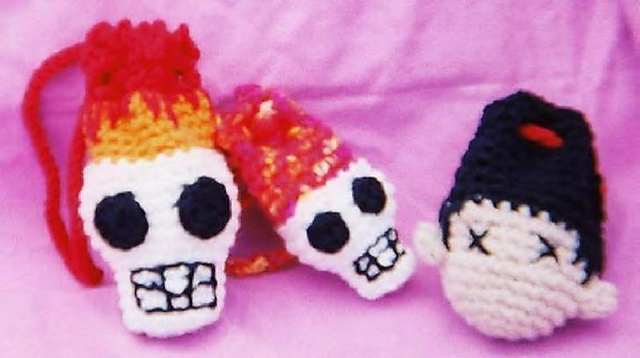 Shrunken Head and Flaming Skulls Wrist Bags