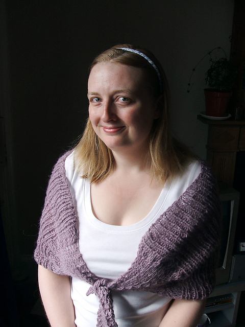 Tie shrug