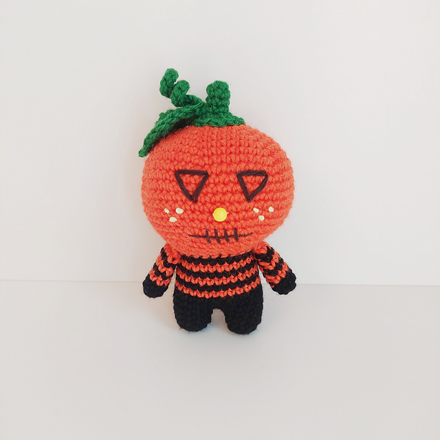Halloween pumpkin face doll
