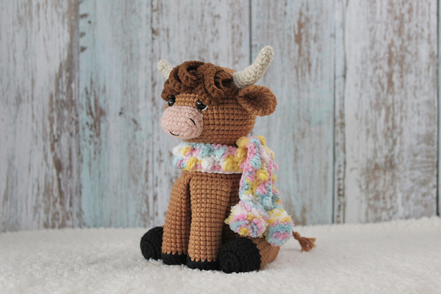 Sitting highland cow