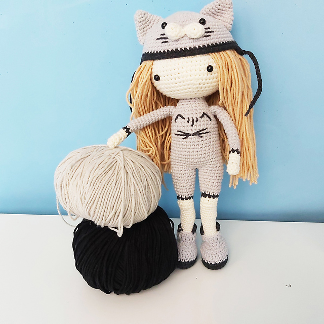 Girl doll amigurumi with cat suit