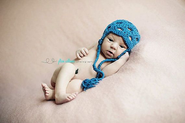Medallion earflap hat