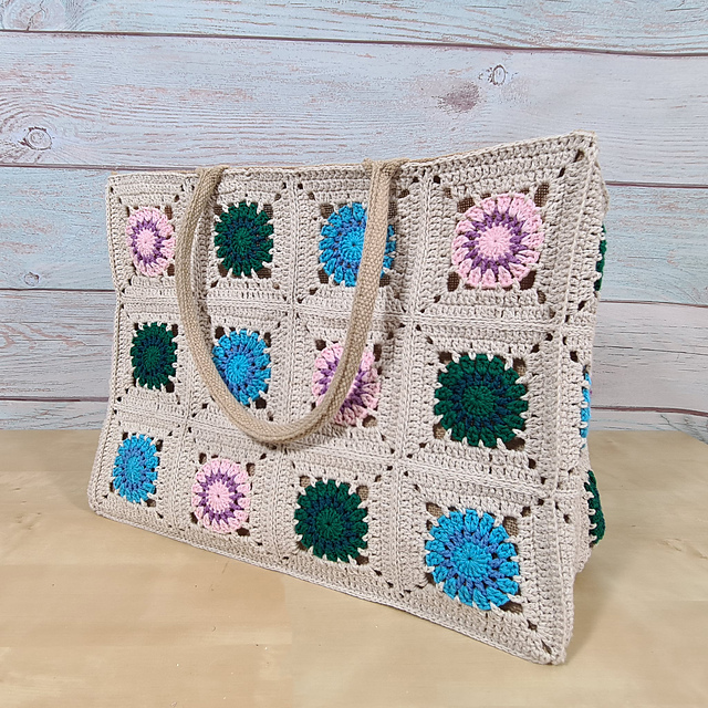 squares in crocheted bag