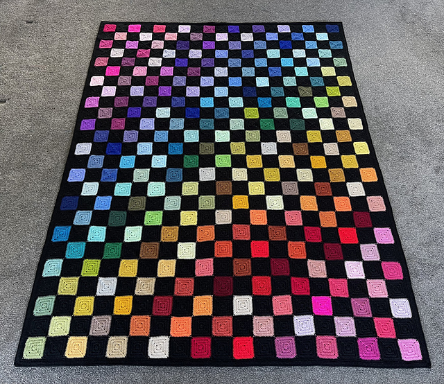 Multi-coloured squares blanket