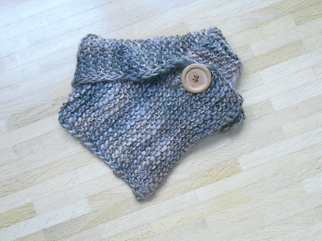 Col fermé par une broche