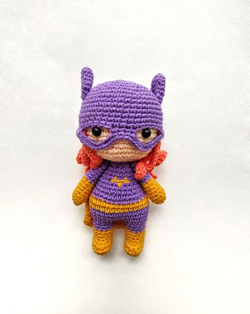 Girl in a purple mask