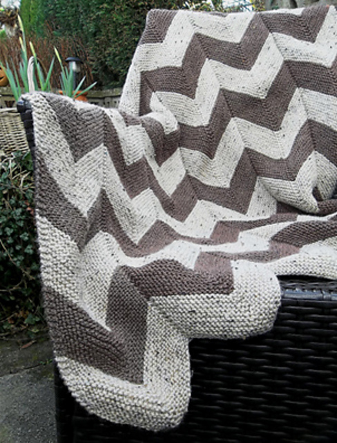 Ravelry: Aran Garter Stitch Chevron Throw pattern by Audrey Wilson