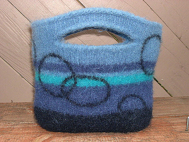 A Fulled Bag with Slot Handles