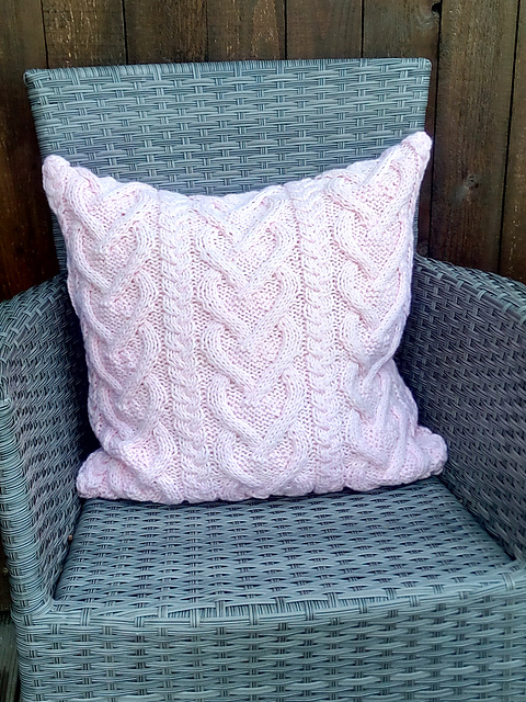 Cabled heart chain pillow
