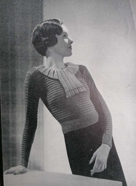 A Jumper With A Pleated Bib