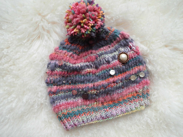 Ravelry: 100% Angora Button Art Yarn Hat pattern by Razzle Dazzle