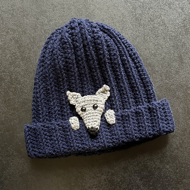 Dog Peeking Out from Beanie