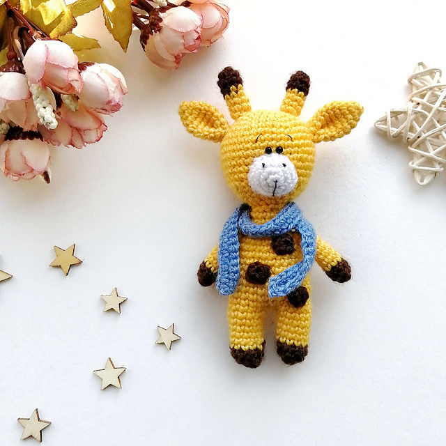 giraffe toy with scarf