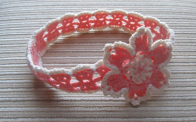 Coral and Peach Crochet Headband with a Flower