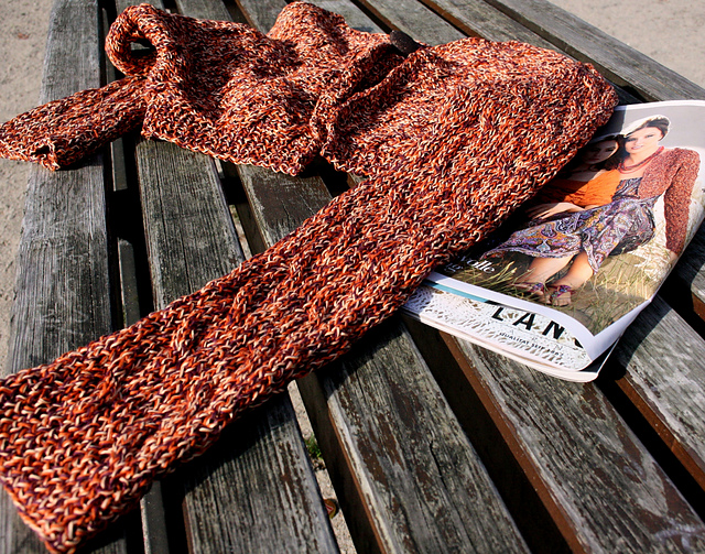 # 04 Quer gestrickter Bolero in Rot meliert
