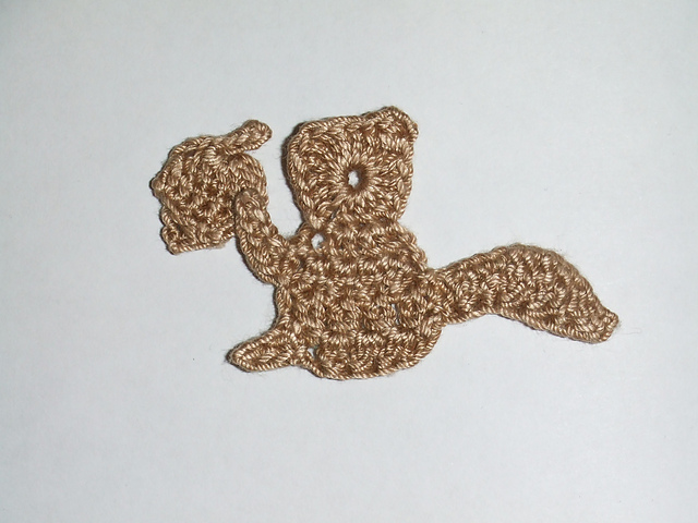 Squirrel & acorn motif