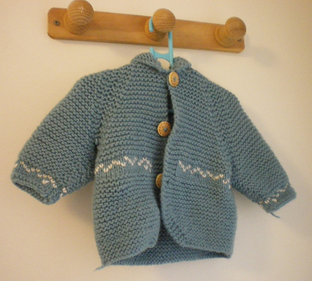 11 - Manteau a capuche