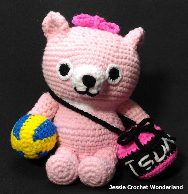 Pink bear with volleyball