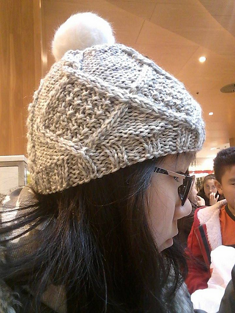 Cabled pompom beanie