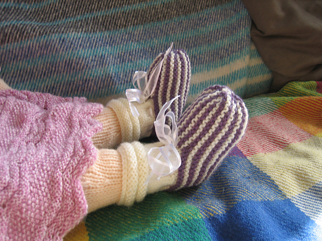 A Baby's Sock with 2 Colours Done in Stripes