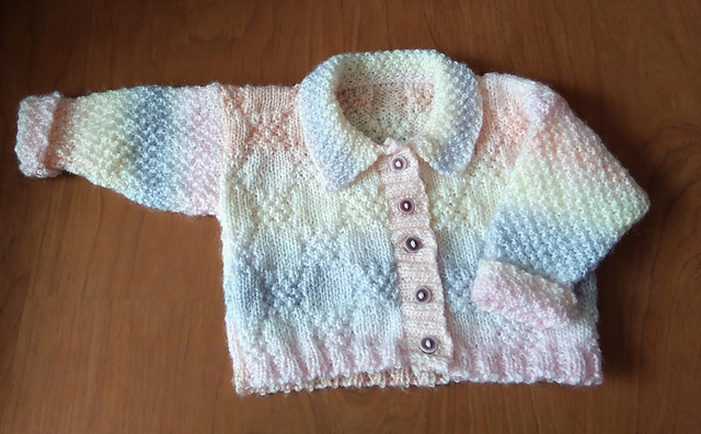 Design Seven - Jacket, Mittens, Hat and Pram Cover