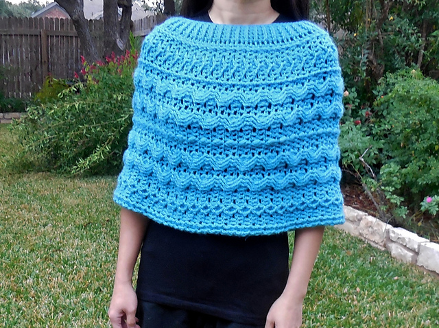 E. Cable Poncho