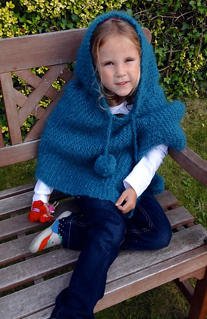 poncho à capuche