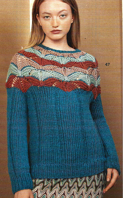 # 47 Pull avec patte ronde