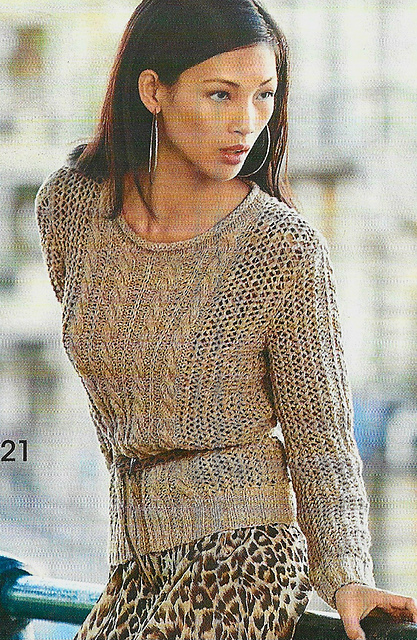 # 21 Pull motif filet avec torsades