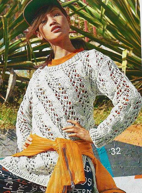 # 32 Pull gris avec torsades en diagonale