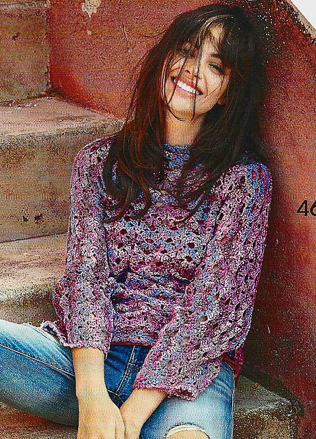 # 46 Pull motif coquille