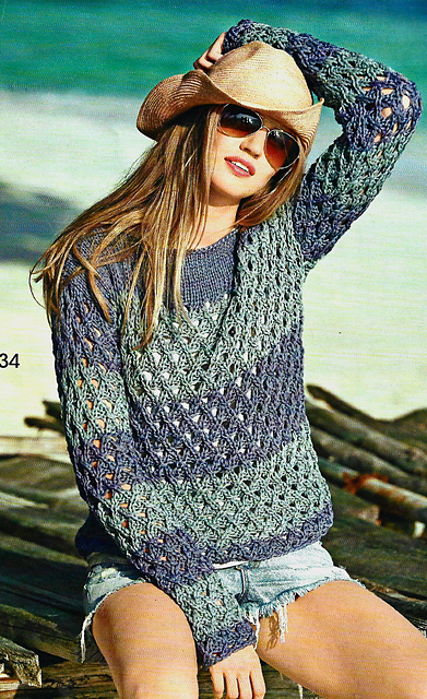 # 34 Pull motif ajouré à rayures