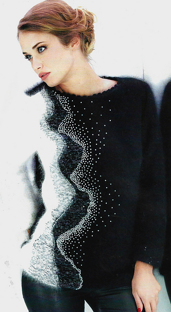 # 32 Pull serti de perles