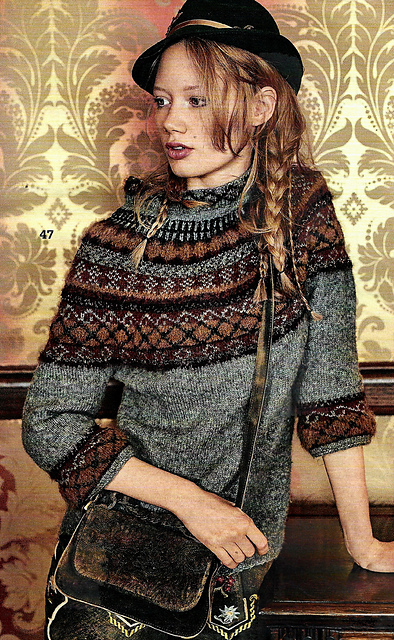 # 47 Pull avec patte motif jacquard