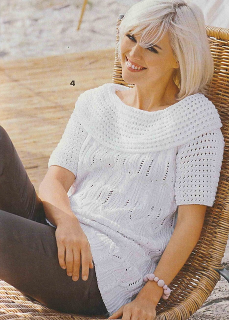 # 04 White long sweater with cable pattern