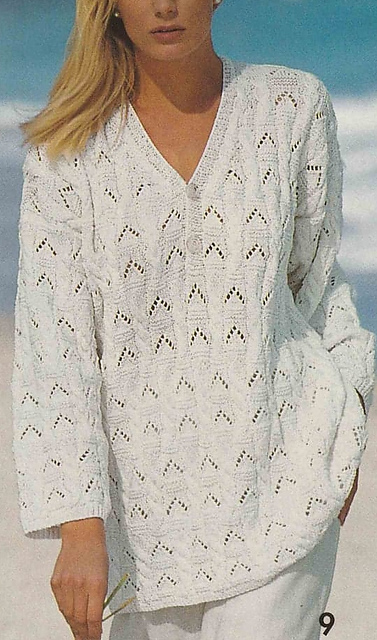 # 09 Pull blanc encolure polo