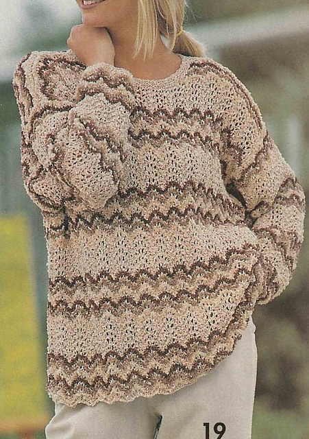 # 19 Pull beige et brun