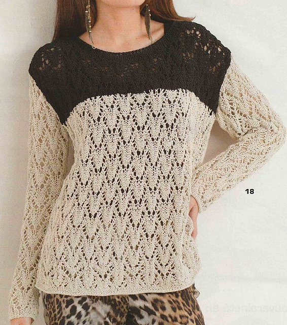 # 18 Pull motif ajouré beige et noir