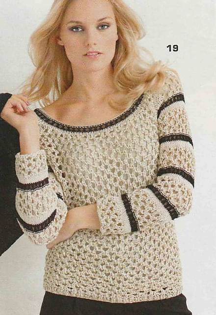 # 19 Pull en motif ajouré beige et noir