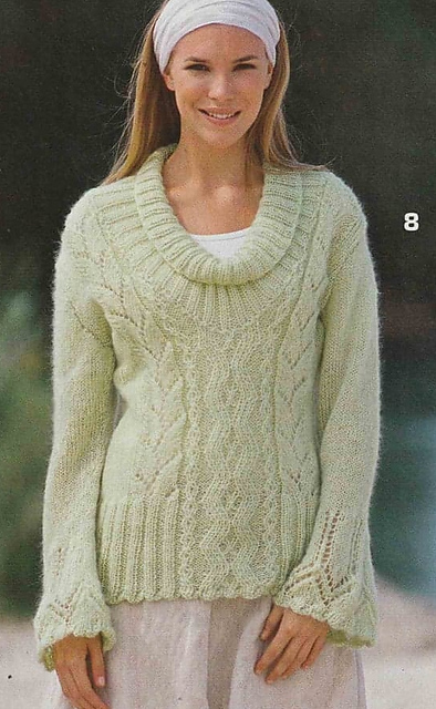 # 08 Pull vert clair à motifs
