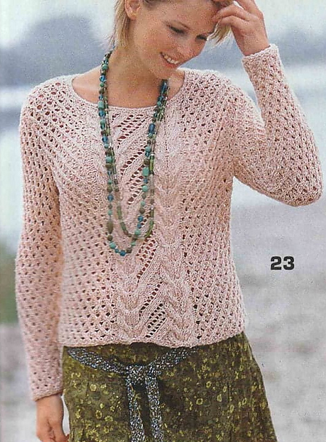 # 23 Pull à motif torsade-ajouré en abricot