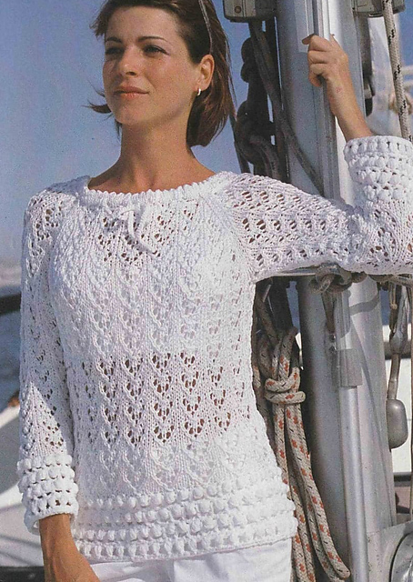 # 03 Pull blanc à bordures crochetees