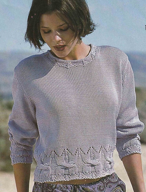 # 15 Pull lilas à bordures ajourées et torsadées