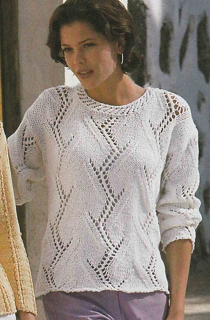 # 17 Pull blanc à motif ajouré