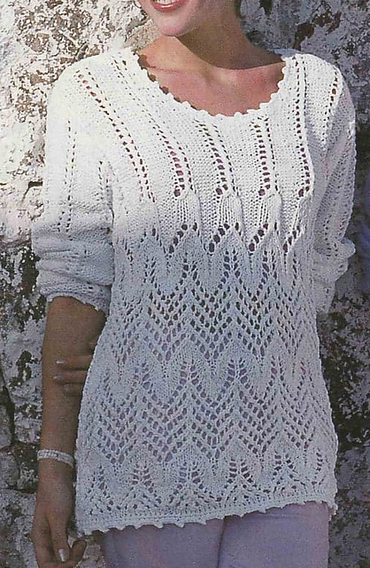 # 20 Pull blanc en motif ajouré