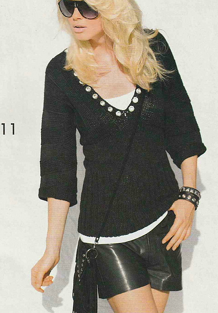 # 11 Pull côtelé noir avec rivets