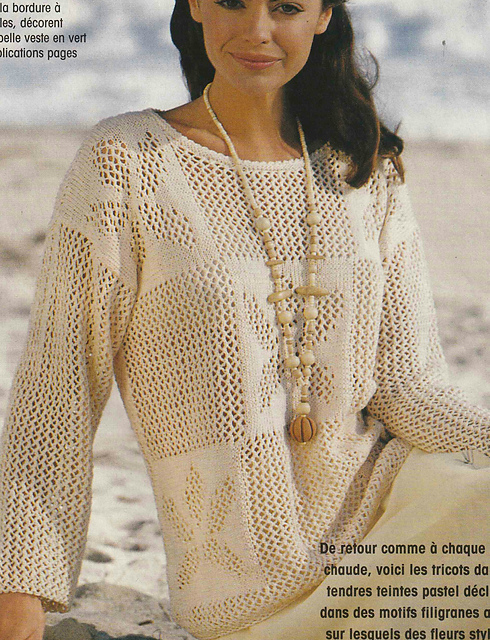 # 01 Pull jaune pâle à motif filet et fleurs