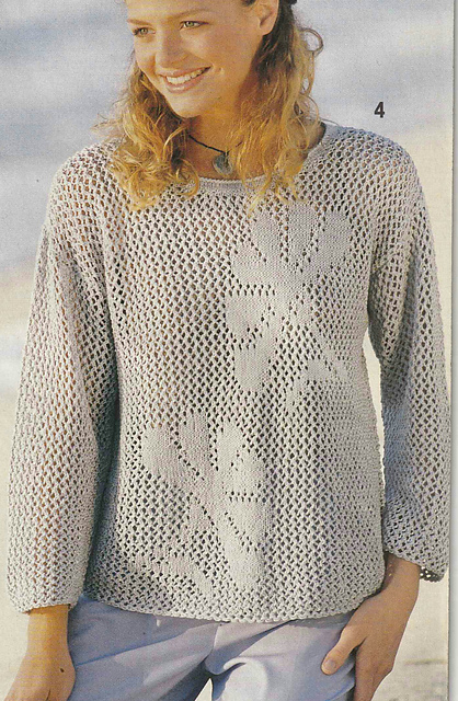 # 04 Pull gris motifs filet et fleurs