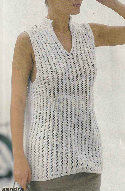 # 31 Pull sans manches à col polo